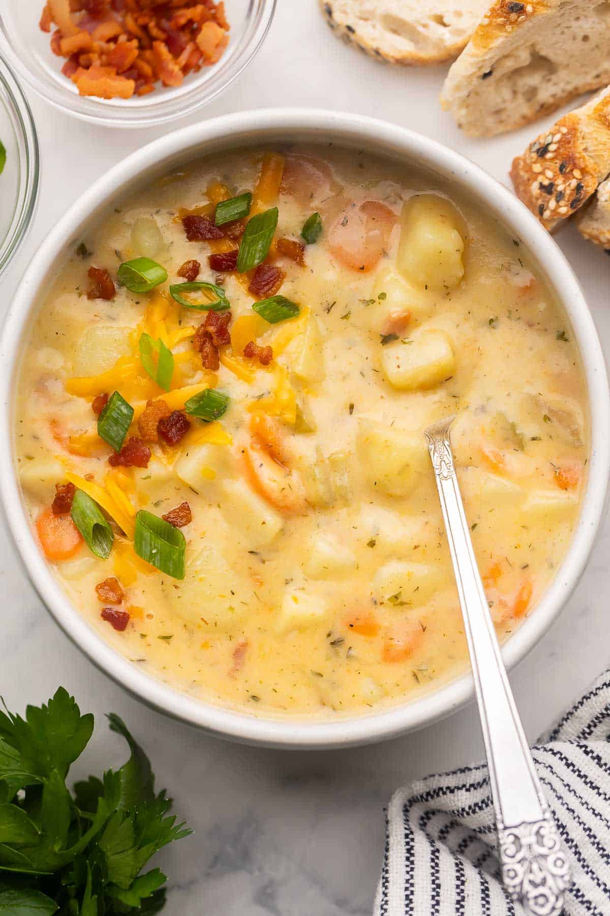 Is crockpot potato soup with cream cheese easy to make? Yes, and it is incredibly delicious too!